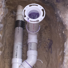 plumbing a toilet drain
